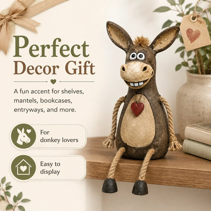 Rustic donkey figure on a plank with dangling rope legs