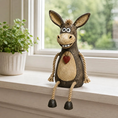 Rustic donkey figure on a plank with dangling rope legs